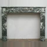 18th century. 'Sainte Anne' grey fireplace mantel. - Reference 0303 Width 4' 9'' ⅛ Height 3' 7'' ¼ 18th century. 'Sainte Anne' grey fireplace mantel. - Reference 0303 Width 4' 9'' ⅛ Height 3' 7'' ¼