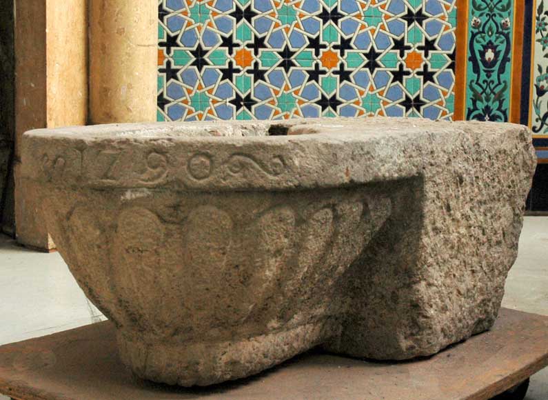 Carved_stone_baptismal_font.jpg
