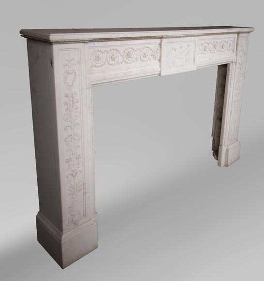Carrara marble mantel with Vulcan's forge cartouche-5
