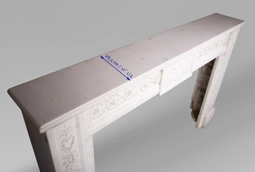 Carrara marble mantel with Vulcan's forge cartouche-13