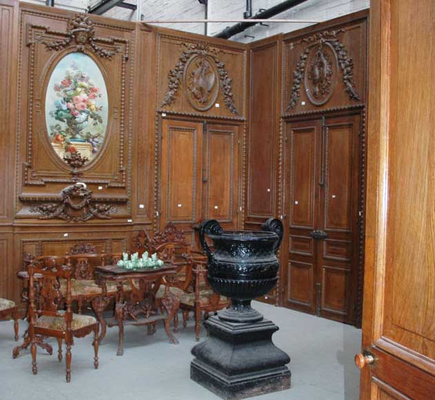 Complete_oak_paneling_with_flower_still_life_paintings_and_hunting_decor.jpg