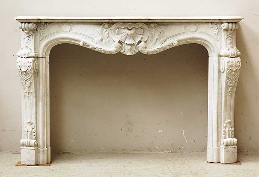 White_marble_Louis_XV_style_fireplace_mantel.jpg