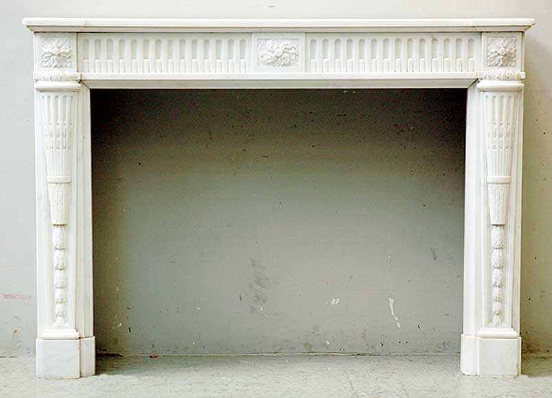 Antique_neo_classical_fireplace_mantel_in_white_marble_from_Carrara.jpg