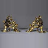 Beautiful pair and antique Louis XV period andirons with Summer Allegories made out of gilded bronze and brown patina bronze