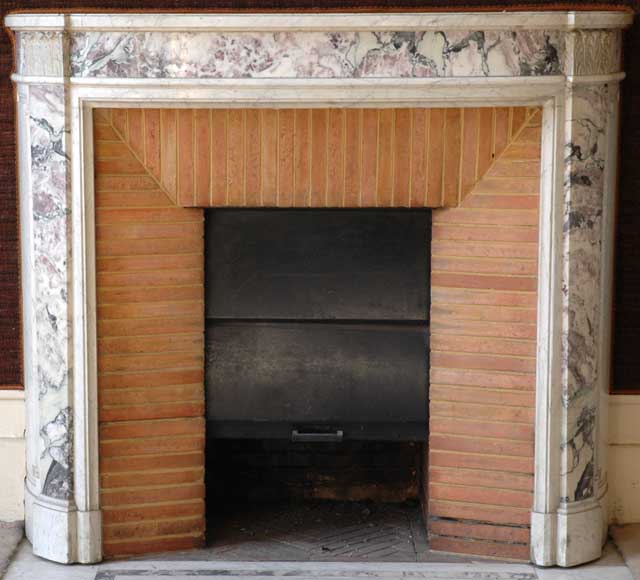 Fireplace_in_white_Carrara_and_peach_flower_marbles_.jpg