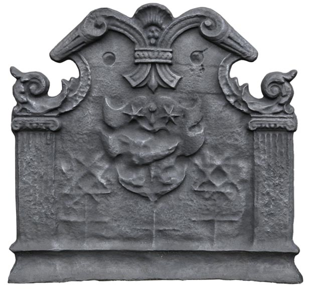 Antique cast iron fireback with coat of arms with a sword and two stars, two ionic pilasters and leather cut pattern, late 17th century -0