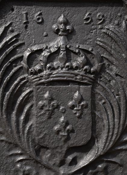 Antique cast iron fireback with the French coat of arms dated 1659-1