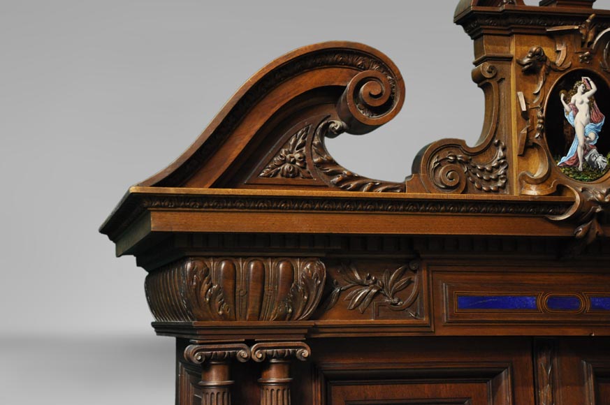 Two-body cabinet, in th Neo-Renaissance style, in carved walnut with enamel and lapis-lazuli inlays-2