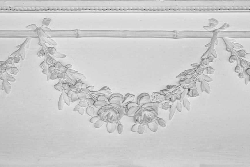An antique large trumeau with garlands of flowers-2