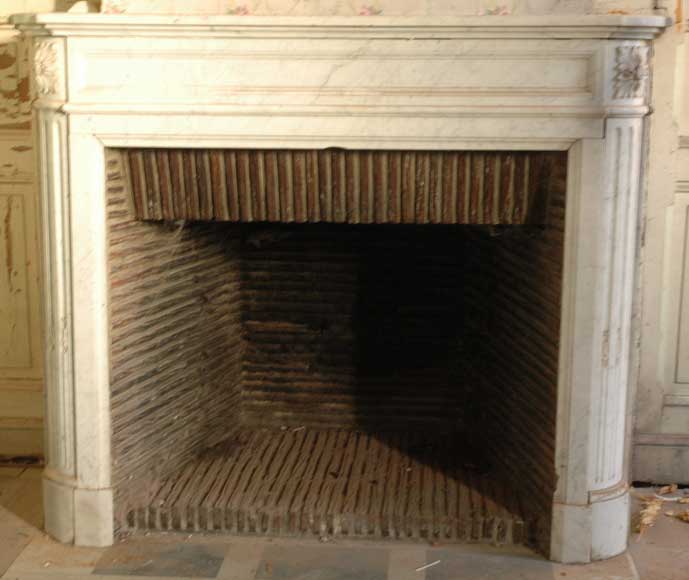 Curved_Louis_XVI_style_white_marble_mantel_.jpg
