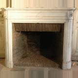 Louis XVI style white marble mantel 