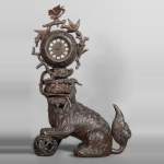 Chinese style clock with Foo dog decoration.