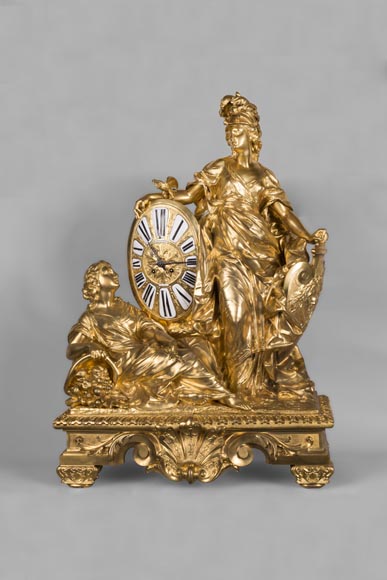 Gilded bronze clock, signed LEROLLE Frères Paris, showing Minerva presenting her shield-0