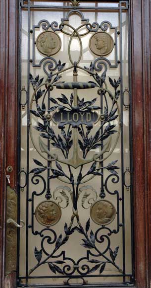 Wrought_iron_entrance_door_with_the_symbol_of___Lloyds_.jpg