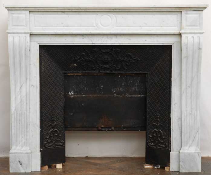 White_marble_Louis_XVI_mantel_with_cast_iron_insert.jpg