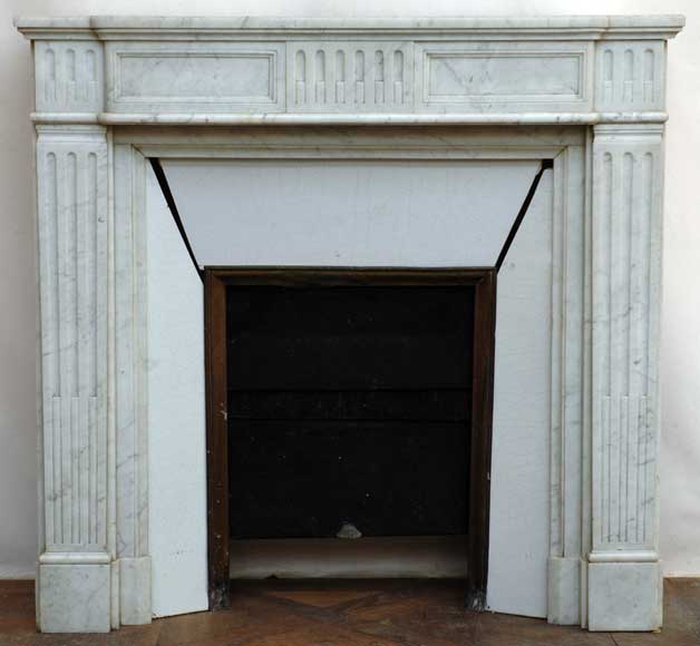 Louis_XVI_style_19th_century_white_Carrara_marble_mantel.jpg