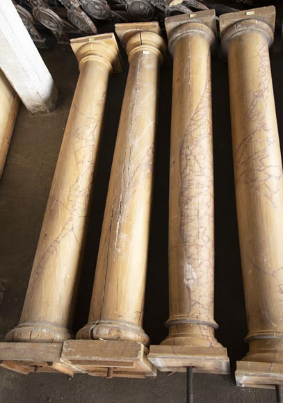 Set of wooden columns painted in imitation marble-2