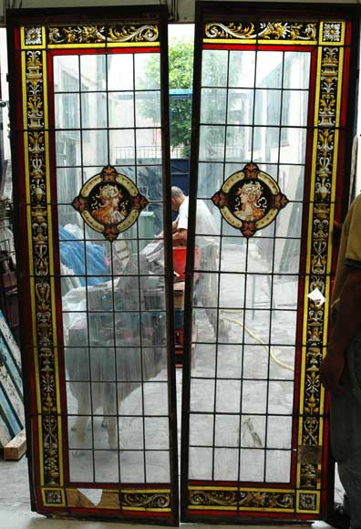 A_double_neo_renaissance_stained_glass_window_.jpg