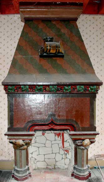 Painted_stone_mantel_with_picturesque_characters.jpg