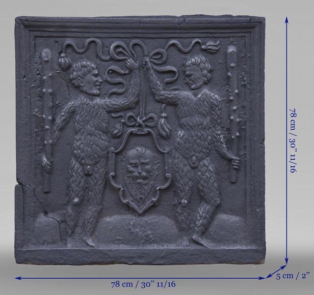 Antique fireback with two savages armed with masses-7
