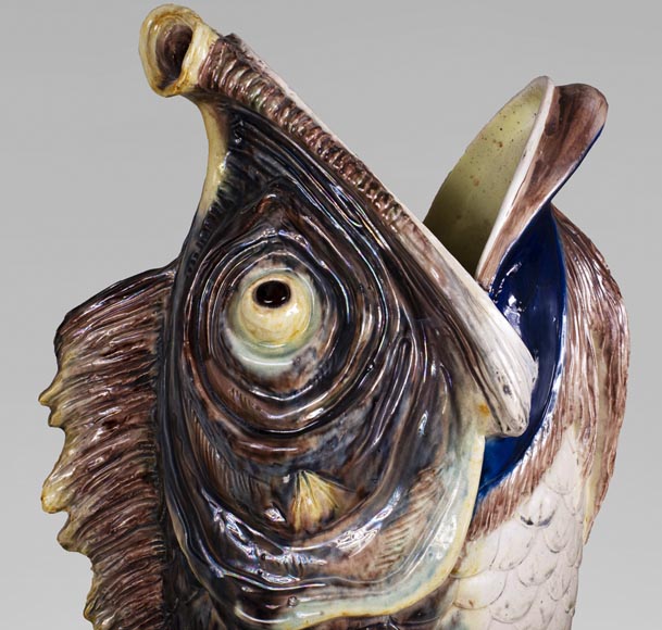 Earthenware umbrella holder representing a fish coming out of a wave-2