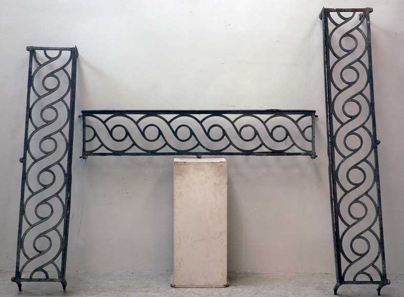 Three_18th_century_iron_window_guards_with_guilloche_decor.jpg