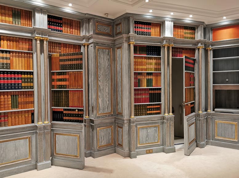 Wood paneled room with trompe l'oeil library decoration, late 20th century-1