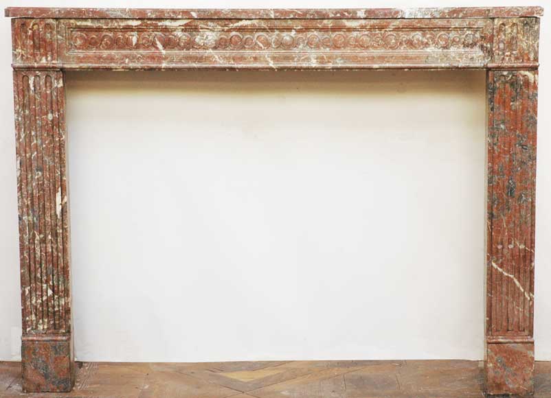 Louis_XIV_period_red_marble_mantel.jpg