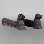 Rare pair of cast iron andirons shaped as a laying dog, Wallonia, 16th century