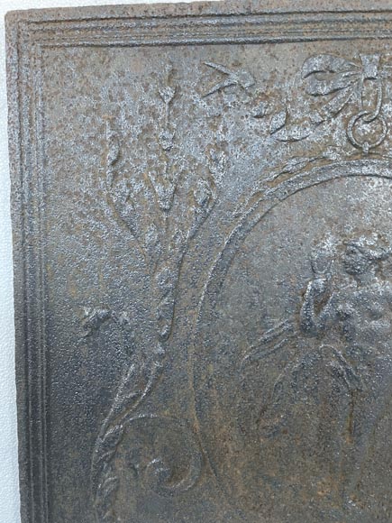 Cast iron fireback depicting Venus in a medallion-2