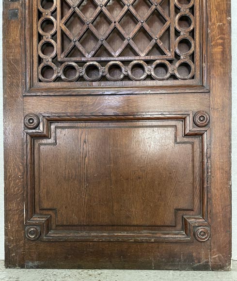 Oak entrance door with open decoration and curved top-8