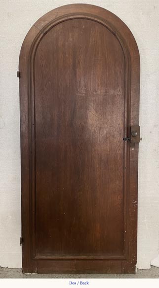 Oak entrance door with open decoration and curved top-9
