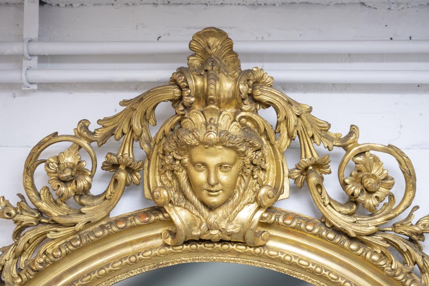Large gilded trumeau with birds, putti and woman’s face on openwork decoration-2
