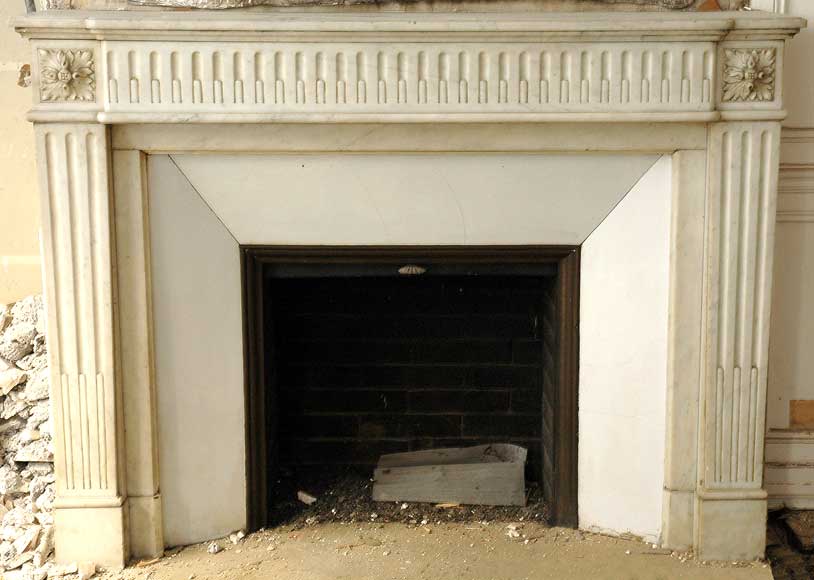 Louis_XVI_white_marble_pilaster_style_mantel.jpg