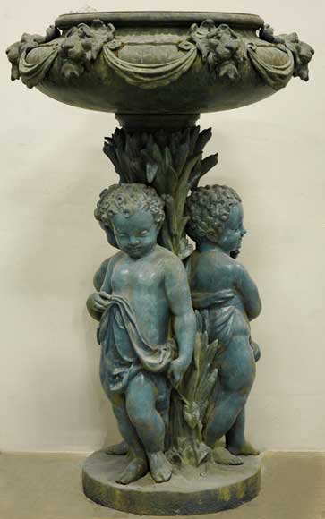 Cast_iron_fountain_with_putti.jpg