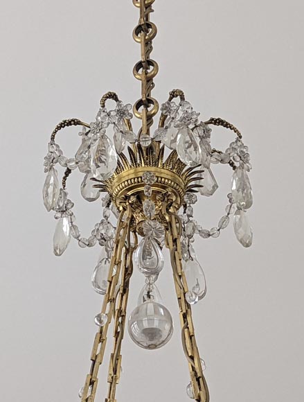 Louis XVI style chandelier in gilt bronze and crystals decorated with rams heads-3