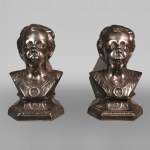 Pair of andirons with child busts