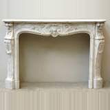Louis XV style mantel with shell and acanthus leaves
