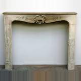 Elegant Louis XV style stone mantel from the 1900's