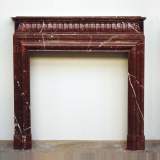 Louis XIV style Red Griotte Marble mantel with an acroterion 