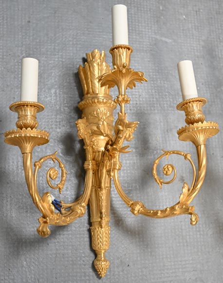 Pair of Louis XVI style ormolu sconces in the shape of a quiver-1