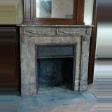 Marble mantel with laurel leaf swags