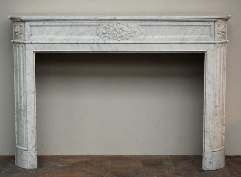 Antique_White_marble_Louis_XVI_mantel_with_curved_edges.jpg