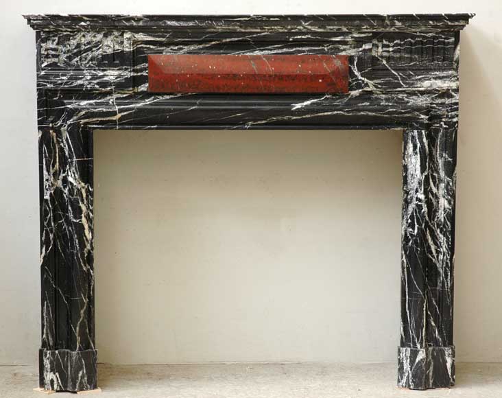 Black_Marquina_marble_mantel_in_the_Louis_XIV_style_.jpg