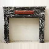 Black Marquina marble mantel in the Louis XIV style 