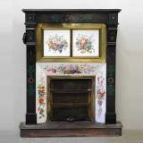 Prussian black marble mantel with polychrome ceramics and malachite inlays