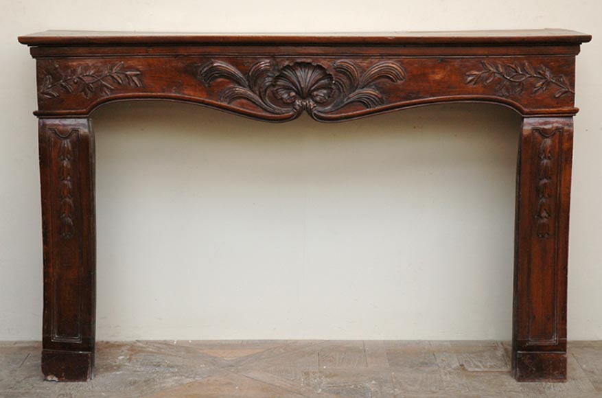 Antique_Louis_XV_period_Walnut_and_Beechwood_mantel.jpg