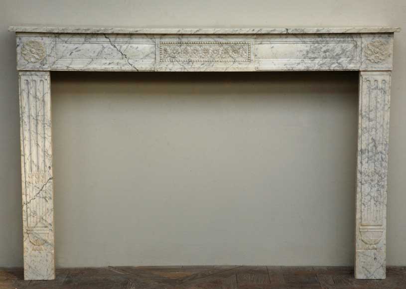 Antique_18th_century_marble_mantel_in_the_Louis_XVI_style.jpg