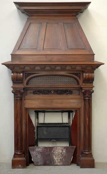 Antique_Walnut_hooded_mantel_from_the_19th_century.jpg