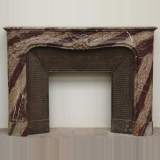 Antique Regence style mantel in Campan marble